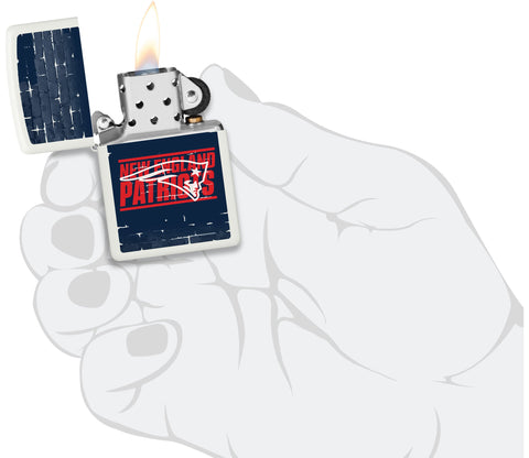 NFL Draft New England Patriots Windproof Lighter lit in hand.