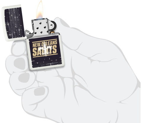 NFL Draft New Orleans Saints Windproof Lighter lit in hand.