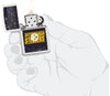 NFL Draft Pittsburgh Steelers Windproof Lighter lit in hand.