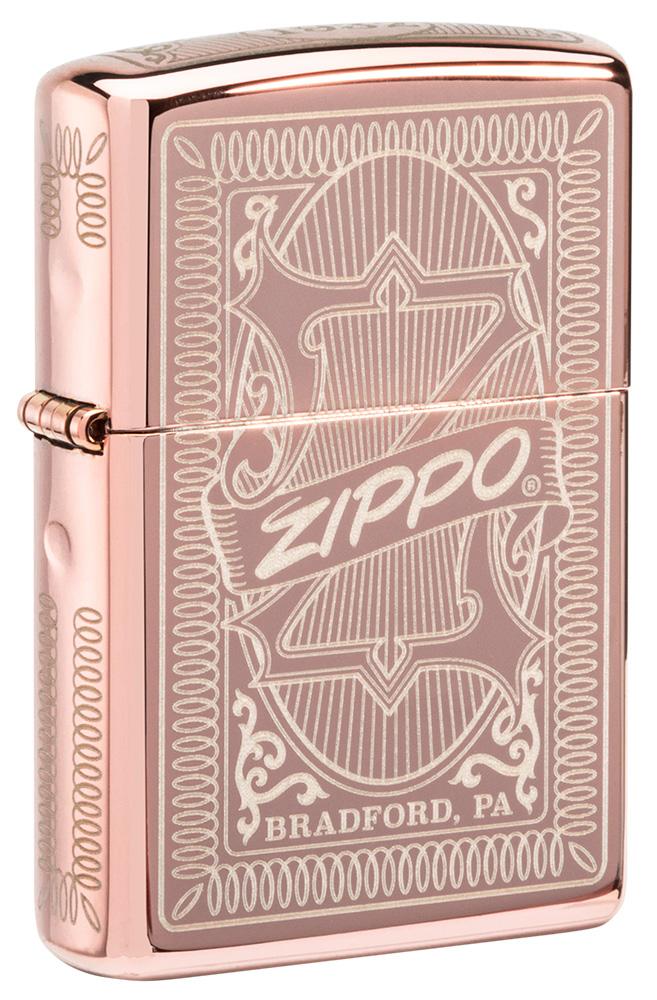 Front shot of Reimagine Zippo High Polish Rose Gold Windproof Lighter standing at a 3/4 angle