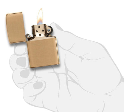 ArmorÂ® Brushed Brass Windproof Lighter lit in hand