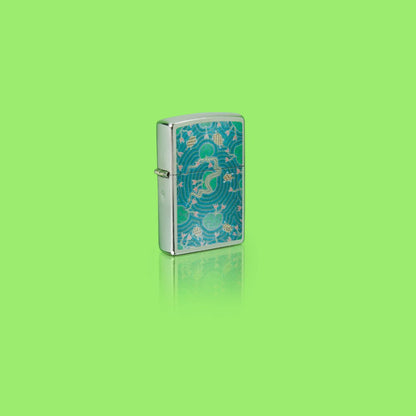 Glamour shot of Zippo John Smith Gumbula Snake & Turple Design Street Chrome Windproof Lighter standing in a green scene.