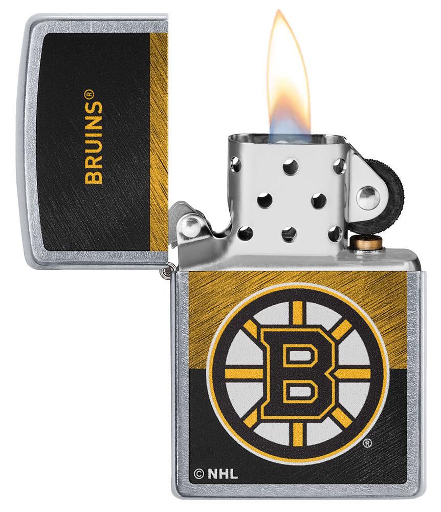 NHL® Boston Bruins Street Chrome™ Windproof Lighter with its lid open and lit