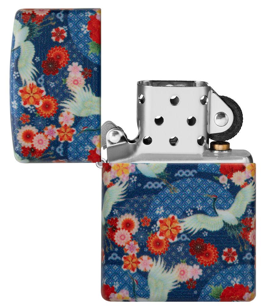 Kimono Design 540 Color Windproof Lighter with its lid open and unlit.