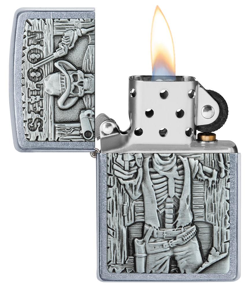 Saloon Skull Emblem Street Chrome™ Windproof Lighter with its lid open and lit