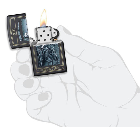 Front view of the Death Card Design Lighter open, in hand and lit 