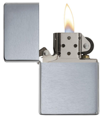 Brushed Chrome Vintage Windproof Lighter with its lid open and lit.