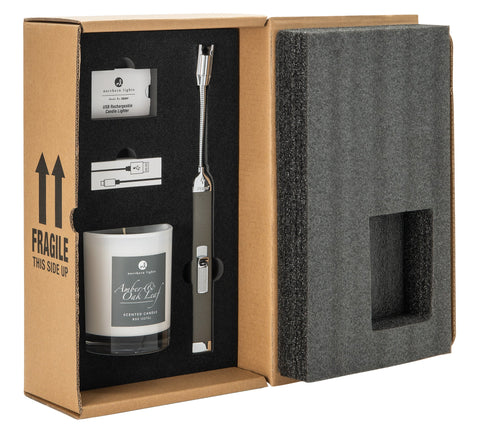Pebble Rechargeable Candle Lighter & 8 oz Amber & Oak Leaf Candle Gift Set open, showing the products inside.