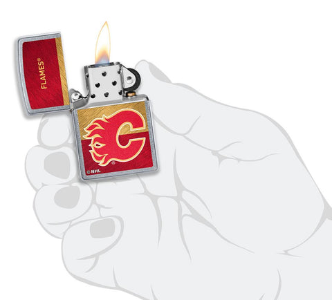 NHL® Calgary Flames Street Chrome™ Windproof Lighter lit in hand