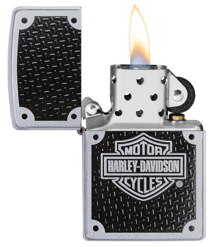Harley-Davidson® Satin Chrome Windproof Lighter with its lid open and lit