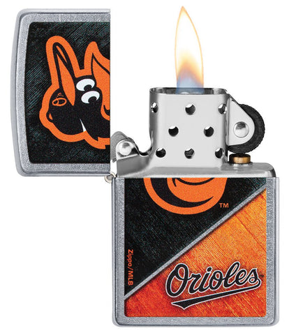 MLB® Baltimore Orioles™ Street Chrome™ Windproof Lighter with its lid open and lit.