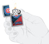 MLB® Chicago Cubs™ Street Chrome™ Windproof Lighter lit in hand.