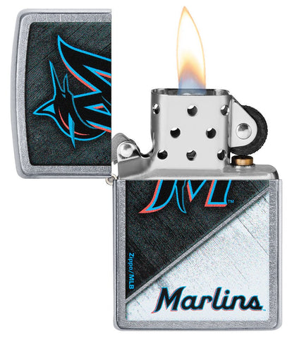 MLB® Miami Marlins™ Street Chrome™ Windproof Lighter with its lid open and lit.