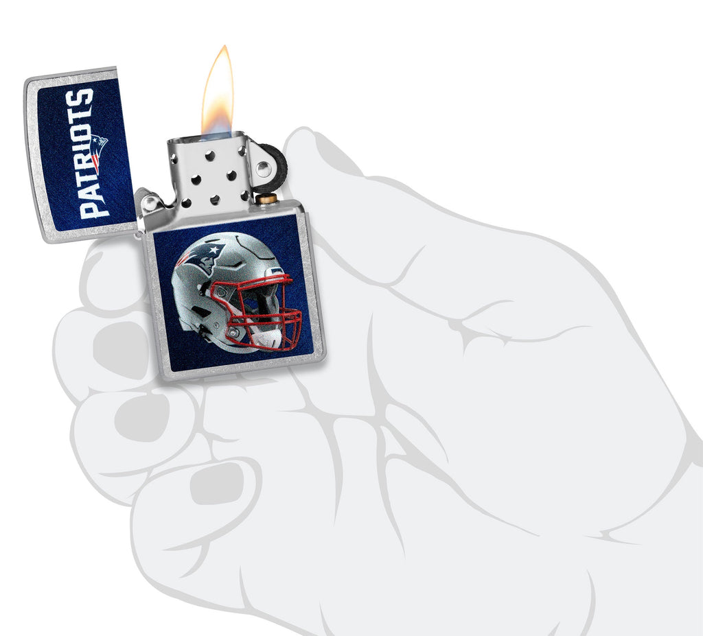 NFL New England Patriots Helmet Street Chrome Windproof Lighter lit in hand.