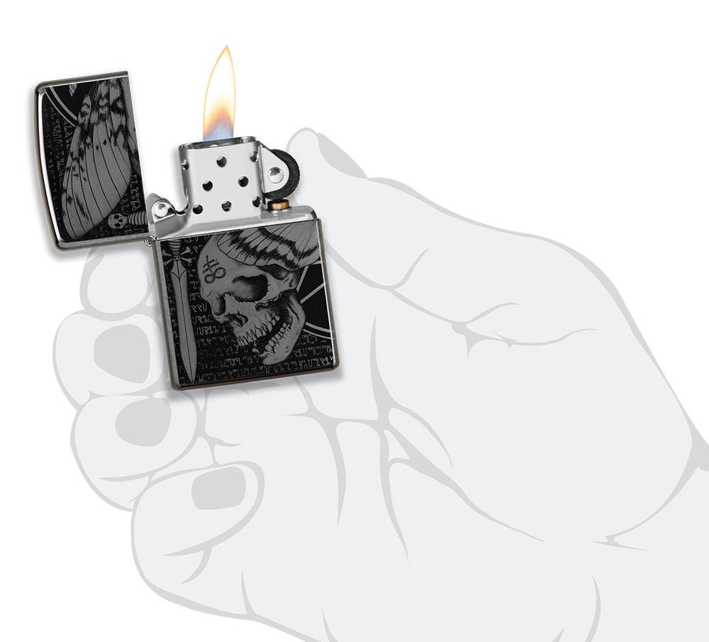 Hawkmoth High Polish Black Windproof Lighter lit in hand