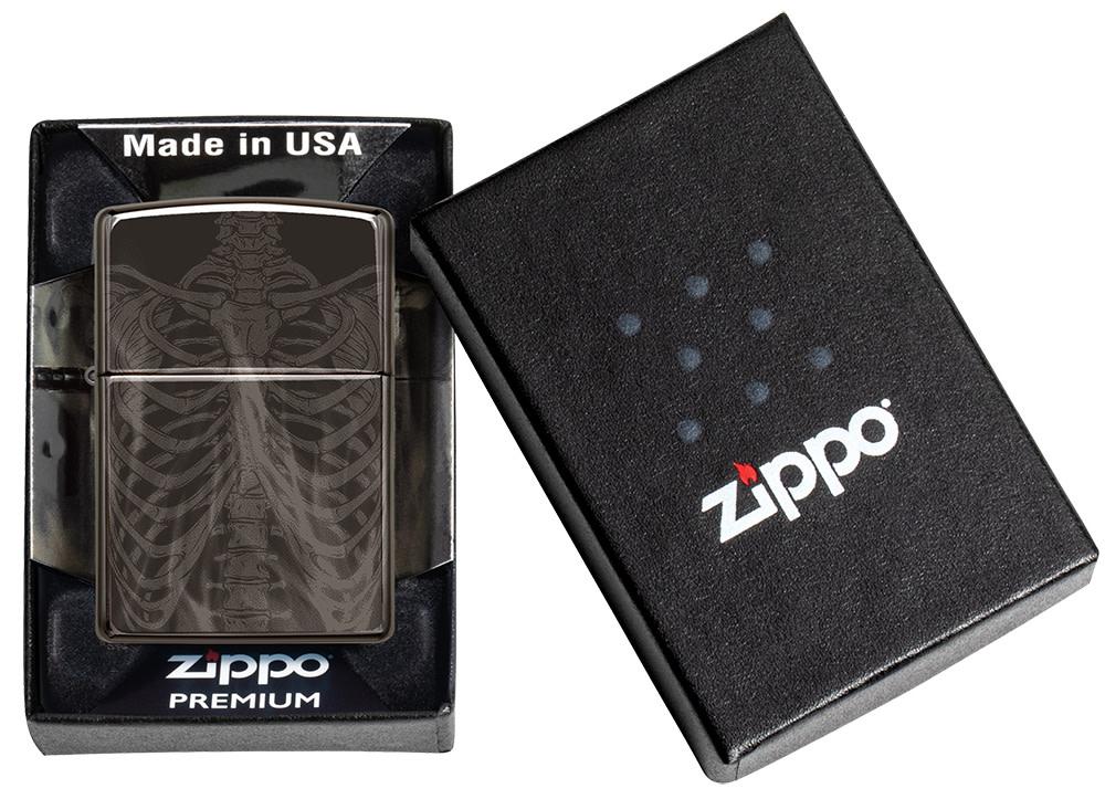 Rib Cage Design High Polish Black Windproof Lighter in it's packaging.