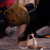 Lifestyle image of AxeSaw chopping wood