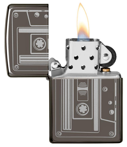 Cassette Tape Black Ice® Windproof Lighter with its lid open and lit