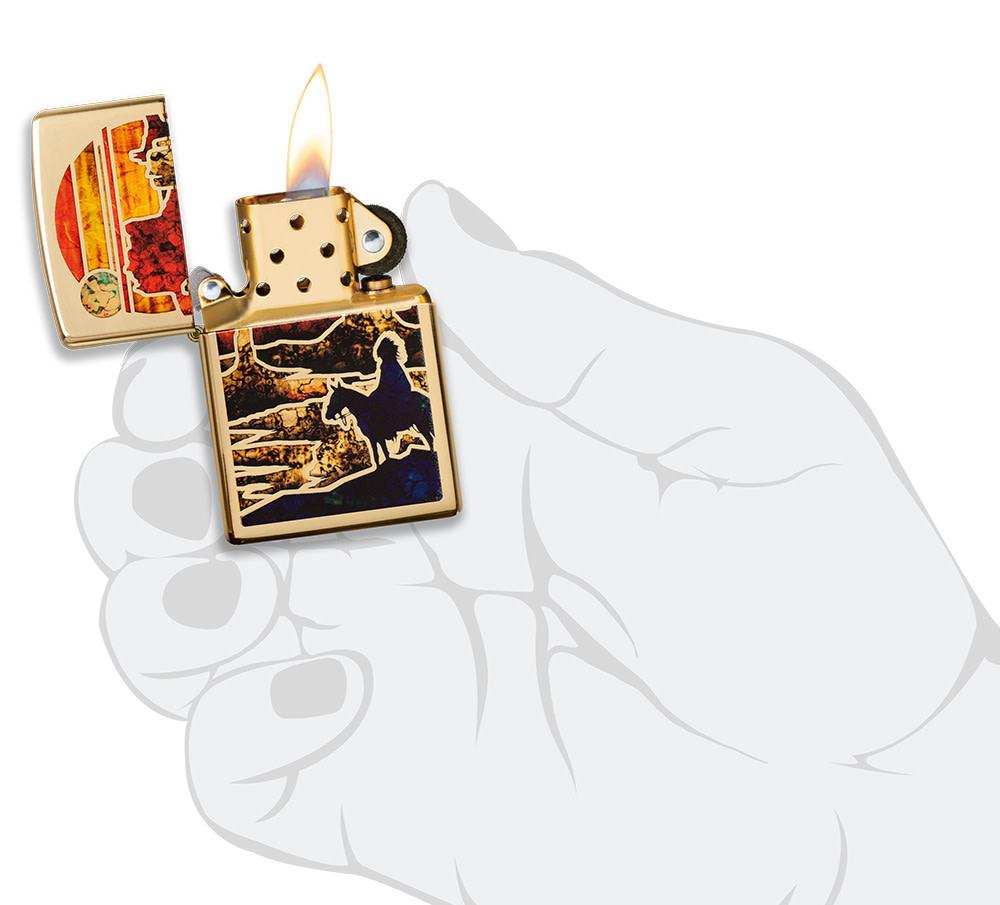 Zfusion Desert High Polish Brass Windproof Lighter lit in hand