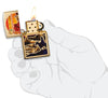 Zfusion Desert High Polish Brass Windproof Lighter lit in hand