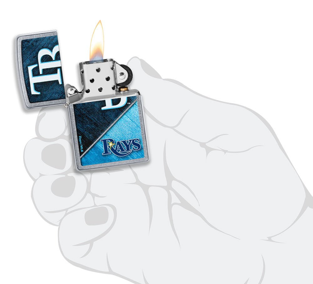 MLB™ Tampa Bay Rays™ Street Chrome™ Windproof Lighter lit in hand.