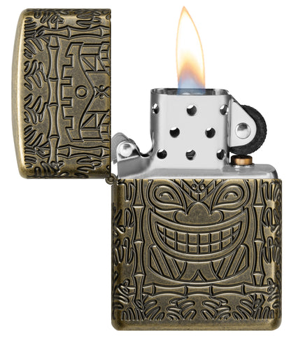 Tiki Design ArmorÂ® Antique Brass Windproof Lighter with its lid open and lit.