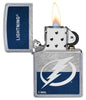 NHL® Tampa Bay Lightning Street Chrome™ Windproof Lighter with its lid open and lit
