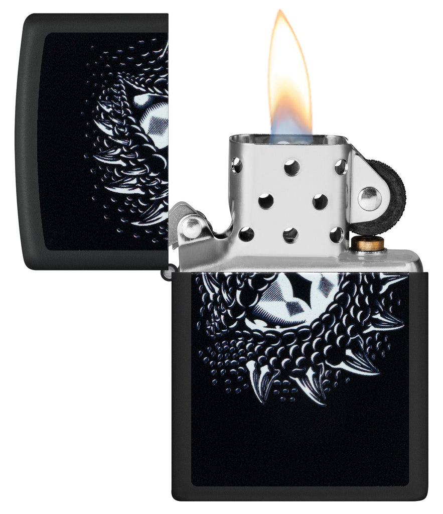 Zippo Black Light Dragon Eye Design Black Matte Windproof Lighter  with its lid open and lit.