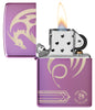 Zippo Anne Stokes Laser 360 High Polish Purple Windproof Lighter with its lid open and lit.
