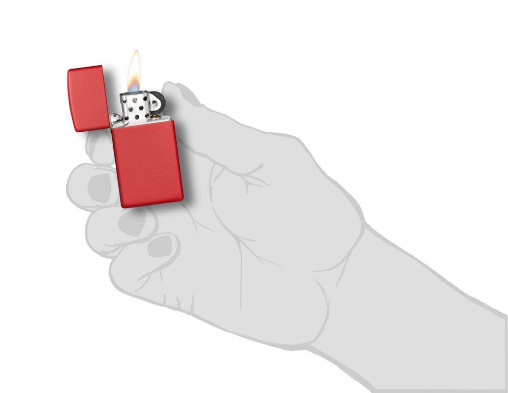 Front view of the SlimÂ® Red Matte, in hand, open and lit