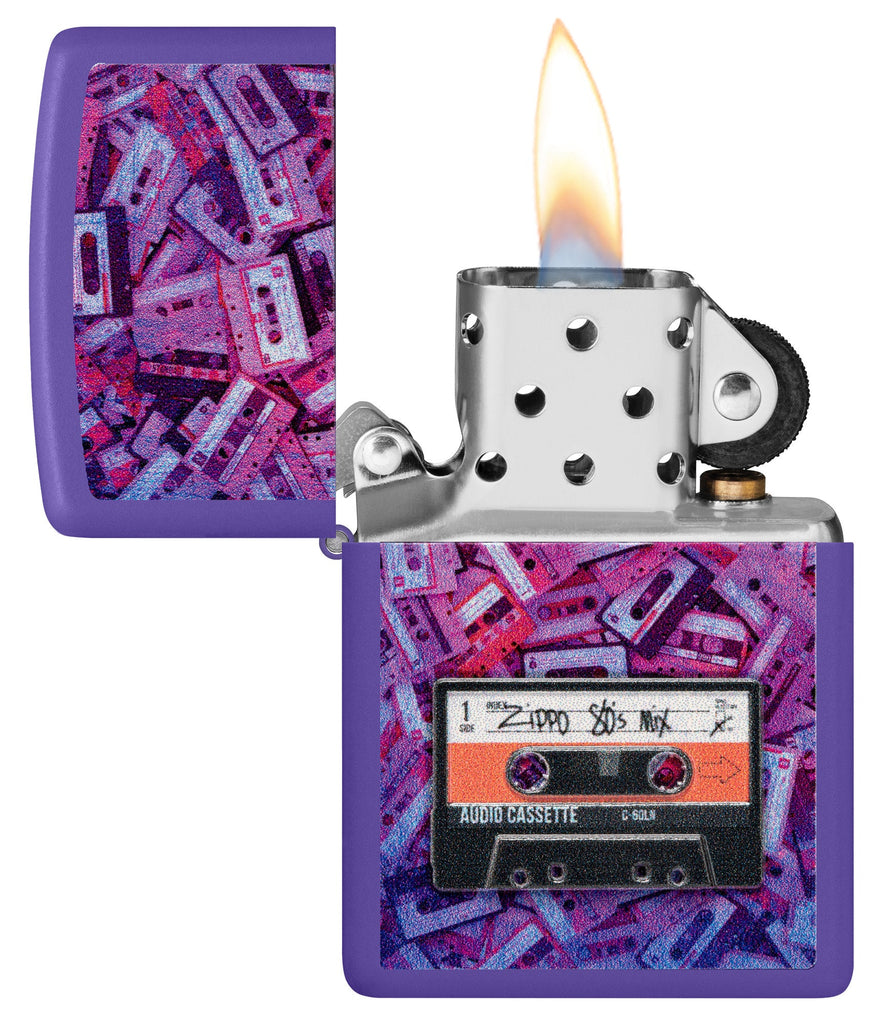 Zippo Cassette Tape Design Purple Matte Windproof Lighter with its lid open and lit.