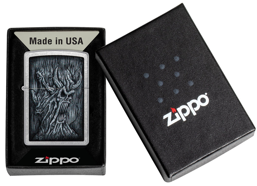 Zippo Evil Tree Design Street Chrome Windproof Lighter in its packaging.