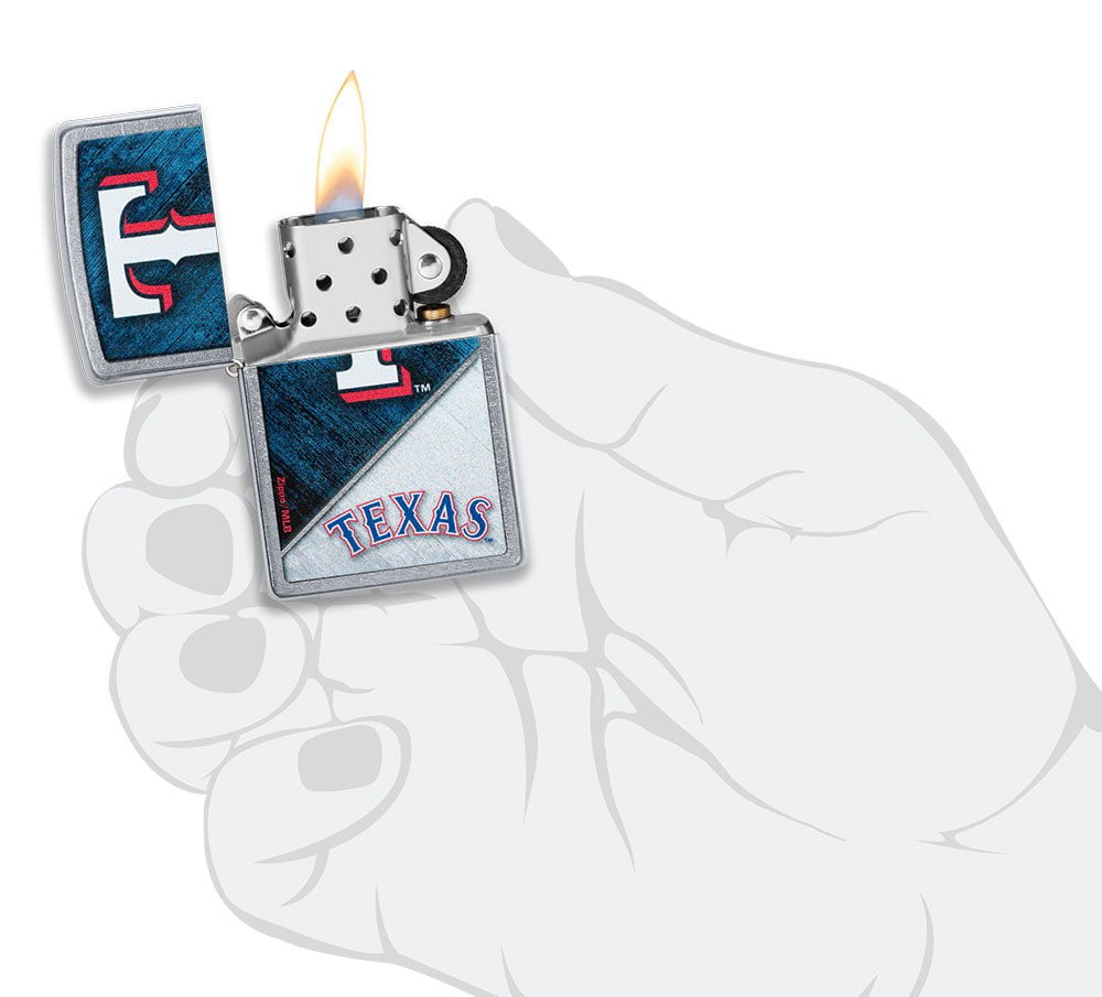 MLB™ Texas Rangers™ Street Chrome™ Windproof Lighter lit in hand.