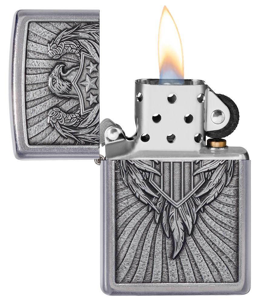Eagle Shield Emblem Design Street Chromeâ„¢ Windproof Lighter with its lid open and lit