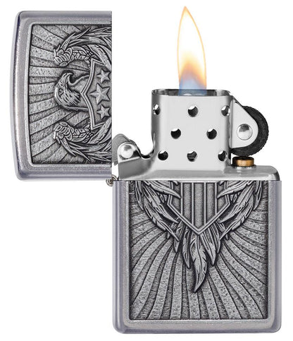 Eagle Shield Emblem Design Street Chromeâ„¢ Windproof Lighter with its lid open and lit