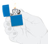 Zippo Sky Blue Matte Zippo Logo Classic Windproof Lighter lit in hand.