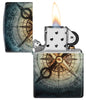 Zippo Compass Ghost Design 540 Glow in the Dark Windproof Lighter with its lid open and lit.