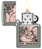 Zippo Death Kiss Design Sage Windproof Lighter with its lid open and lit.