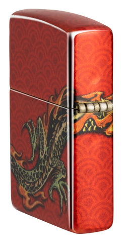Zippo Dragon Design 540 Fusion Windproof Lighter standing at an angle, showing the back and hinge side of the lighter.
