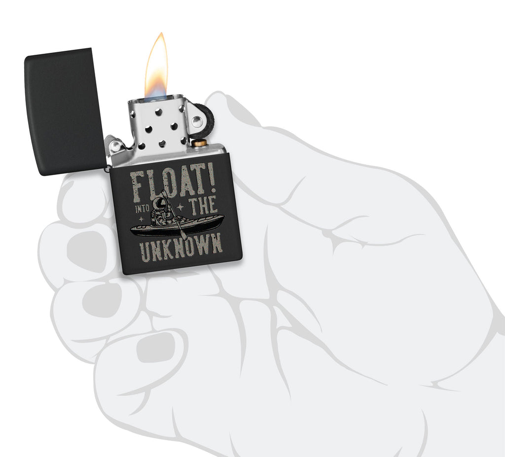 Zippo Float into the Unknown Design Black Matte Windproof Lighter lit in hand.