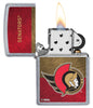 NHL® Ottawa Senators Street Chrome™ Windproof Lighter with its lid open and lit