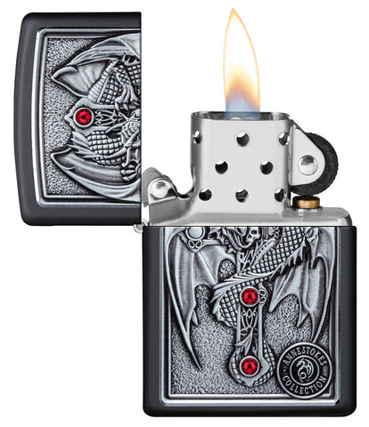 Anne Stokes Gothic Guardian Emblem Black Matte Windproof Lighter lit in hand.