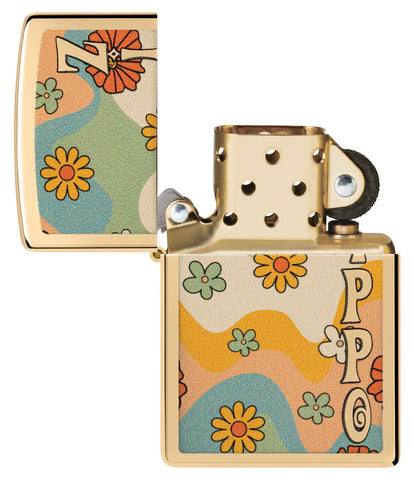 Zippo Flower Power Design High Polish Brass Windproof Lighter with its lid open and unlit.