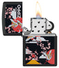 Zippo Kimono Design Black Matte Windproof Lighter with its lid open and lit.