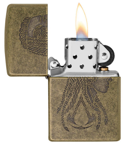 Assassin's Creed® Valhalla pocket lighter open and lit on a white background