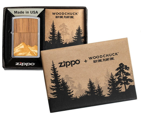 WOODCHUCK USA Mountains Brushed Chrome Windproof Lighter in its packaging.