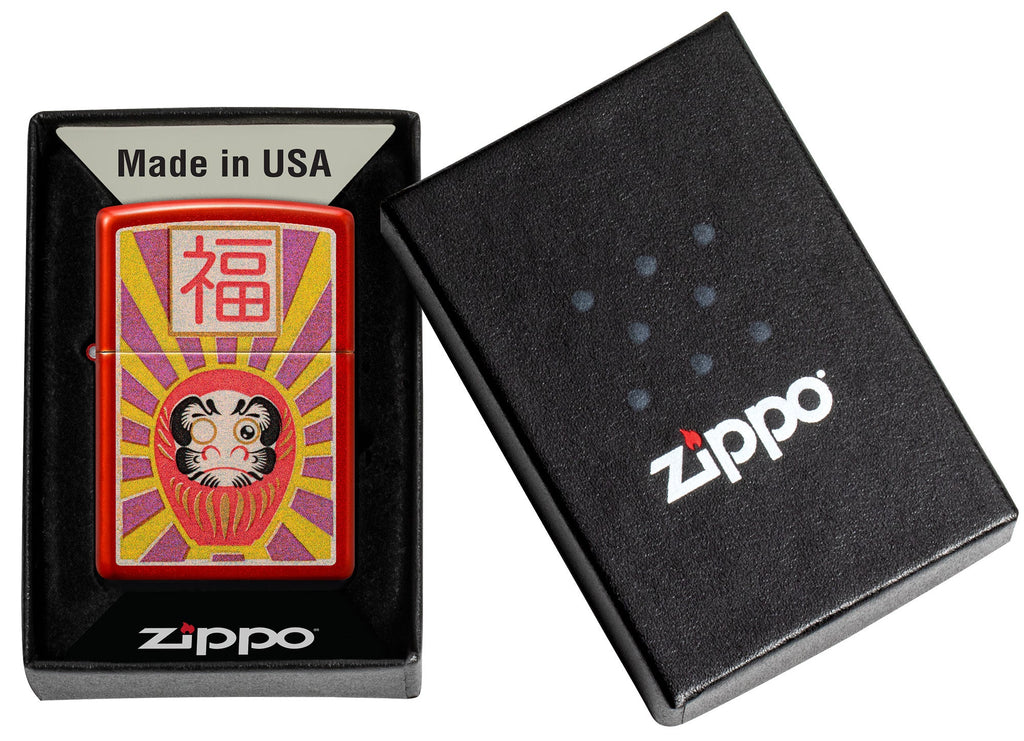 Zippo Daruma Design Metallic Red Windproof Lighter in its packaging.