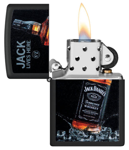 Jack Daniel's Jack Lives Here Black Matte Windproof Lighter with its lid open and lit.