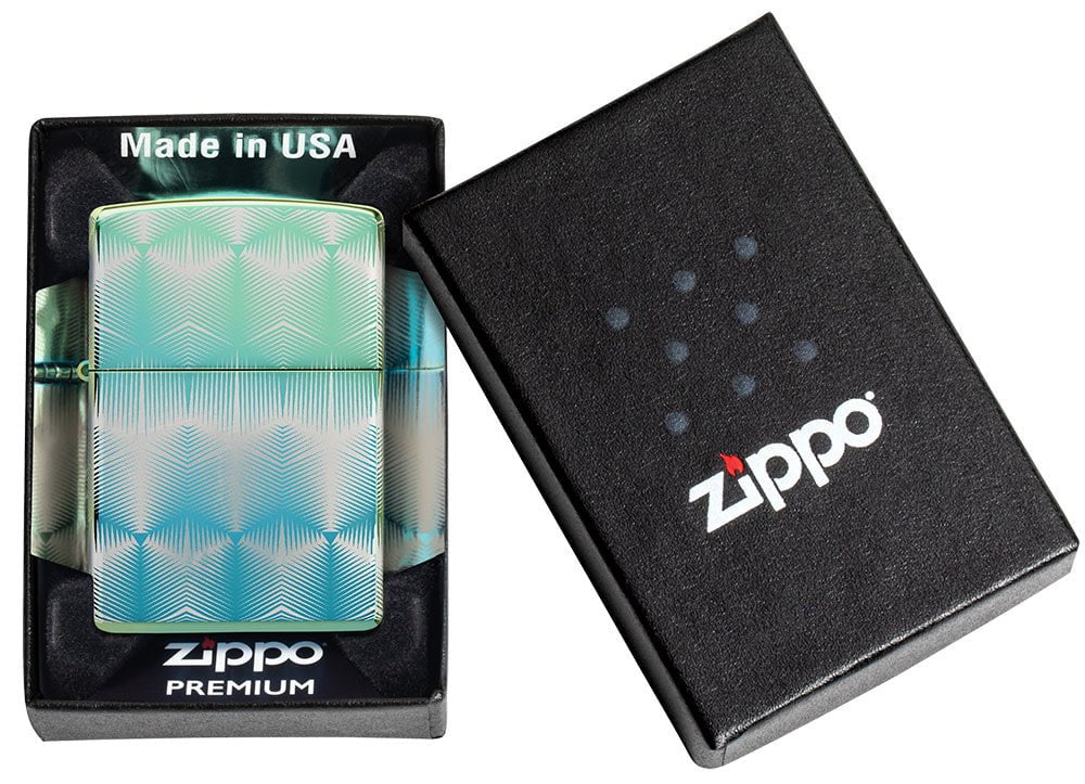 Pattern Design High Polish Teal Windproof Lighter in its packaging.