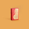 Lifestyle image of Year of the Tiger Design Red Matte Windproof Lighter standing in a yellow background.